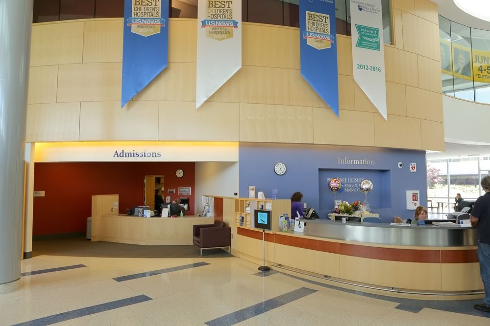 Admissions Department desk at the main entrance of the Penn State Health Milton S. Hershey Medical Center main hospital.