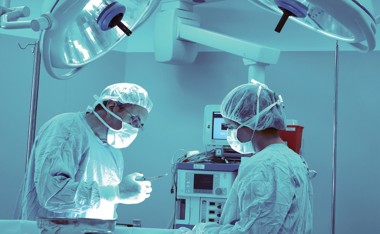 Image of medical professionals in an operating room. 